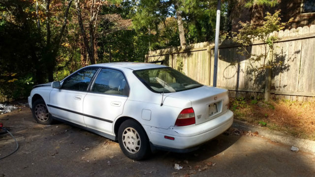 1994 Honda Accord LX. White. Car is NOT running. It has a broken timing belt. 1994 Honda Accord 4 Door
