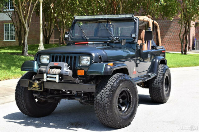 1994 Jeep Wrangler Sahara 4L I6 Manual 4WD SUV Lift Kit LED Light Bar 1994 Jeep Wrangler Sahara 34" Tires, Lifted. LED light bar