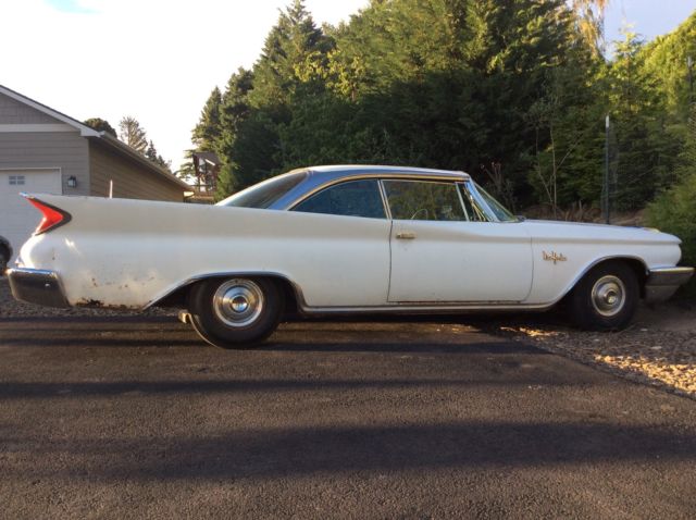 2 door 413 Golden Lion 1960 Chrysler New Yorker chrome