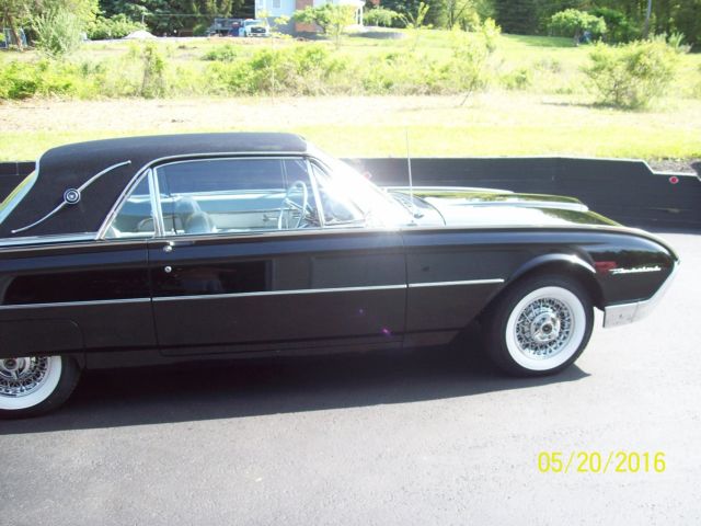 2 door coupe raven black, corbra vinyl top, landau, interior light silver blue 1962 Ford Thunderbird