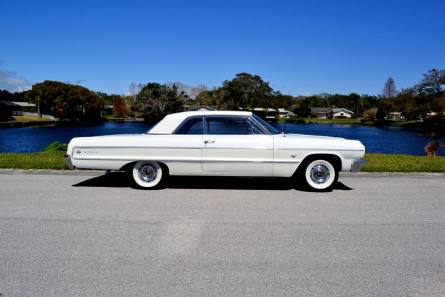 327 V8 AUTOMATIC POWER STEERING FULL WHEEL DISC CAPS STEEL RIMS WHITE WALL TIRES 1964 Chevrolet Impala
