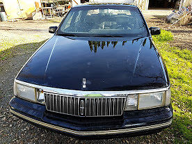 4 door, black exterior and interior, leather seats, new transmission 1991 Lincoln Continental Black & Silver