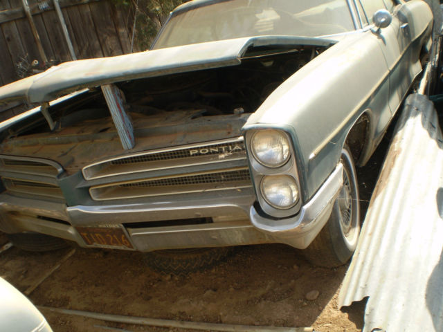 66 Pontiac Grand Prix, Poor condition, running when parked 26 years ago 1966 Pontiac Grand Prix