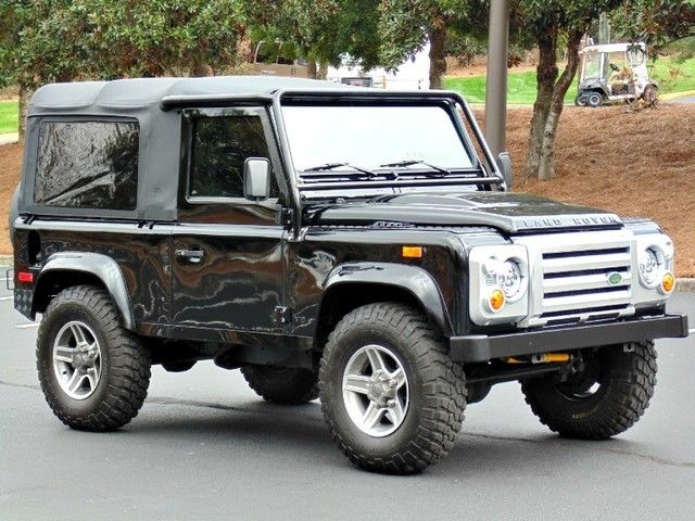 AdventureMotorCars presents RESTORED 1994 Black Defender 90 Soft Top! 1994 Land Rover Defender Soft Top