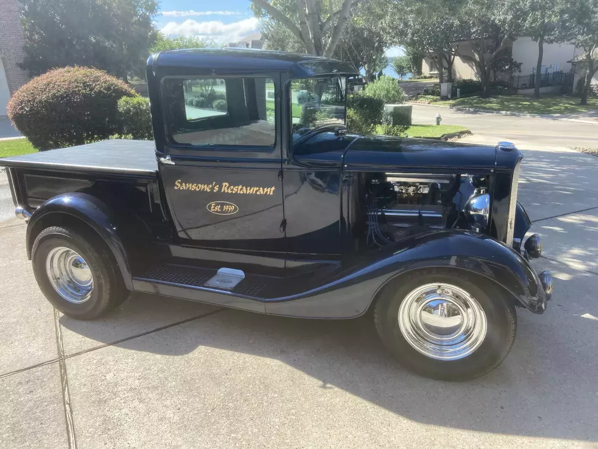 All steel body & fenders, '32 grille, wood-plank truck bed. small block Chevy V8 1931 Ford Model A