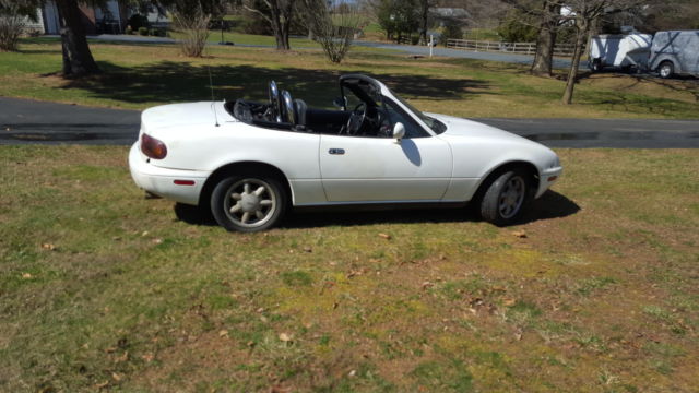 All stock base model automatic. Top down motoring fun right around the corner. 1992 Mazda MX-5 Miata