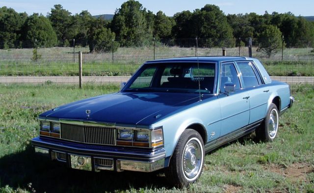 Beautiful two tone blue with padded 1/4 Vinyl top 1977 Cadillac Seville