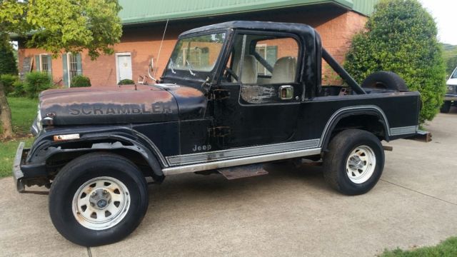 Black 1982 Jeep CJ-8 Scrambler Laredo. 1982 Jeep CJ Laredo