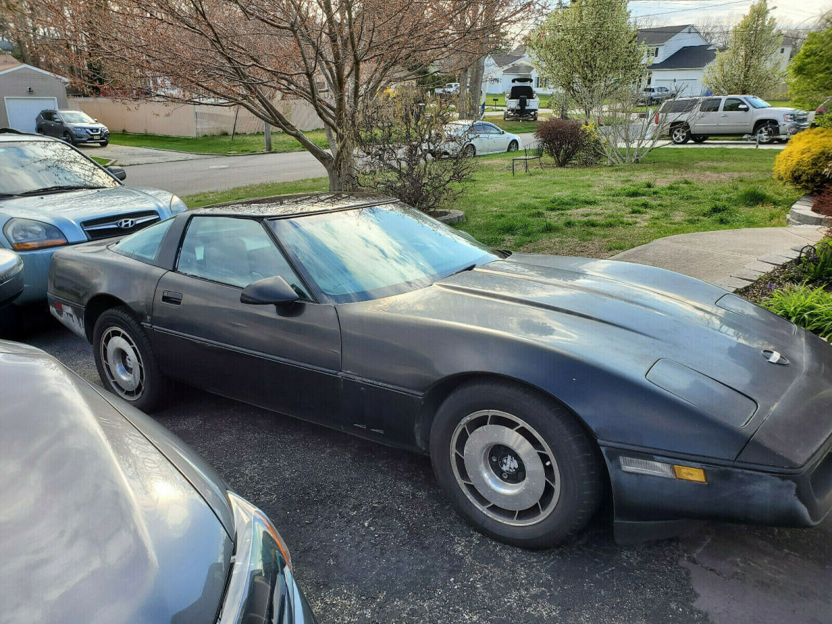 Black and Tan 1985 Chevrolet Corvette TOW AWAY 1985 Chevrolet Corvette
