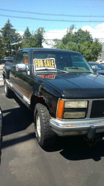 Black Pick-up Truck 4 wheel drive 1993 GMC Sierra 1500