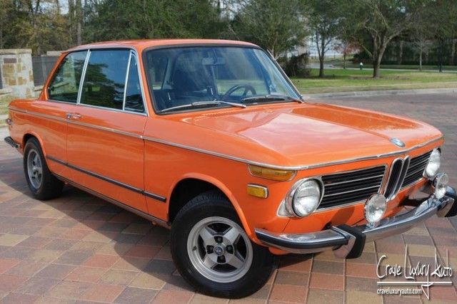 BMW 2002 4-speed orange rare Crave Luxury Auto 281-651-2101 1973 BMW 2002