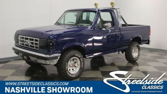 Classic original 4x4 four by four blue manual 4WD 1988 Ford F-150 4x4