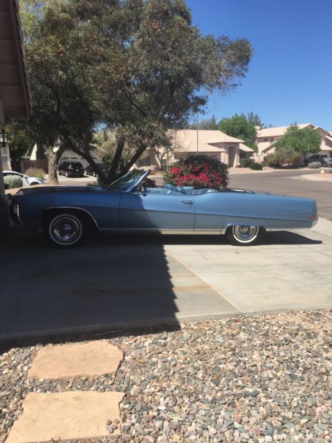 Clean 1969 Buick Electra 225 blue, with blue interior, and white convertible 1969 Buick Electra