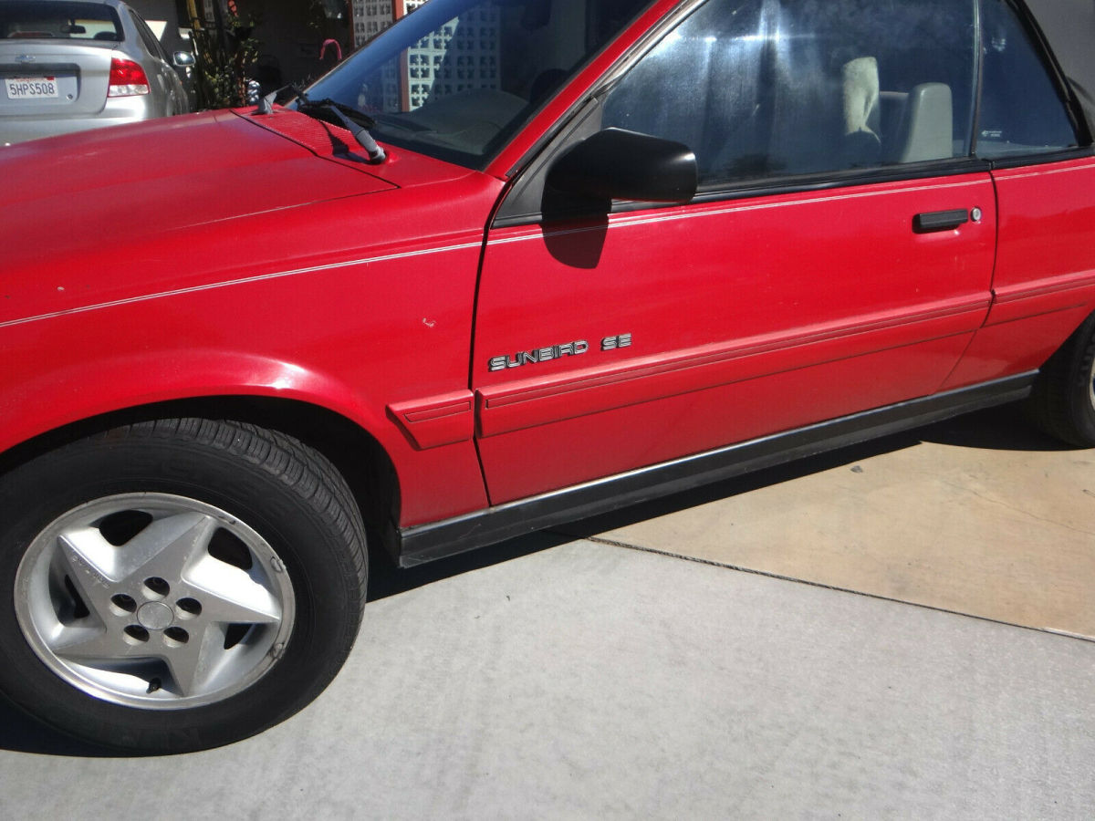 1993 Pontiac Sunbird SE - photo 4