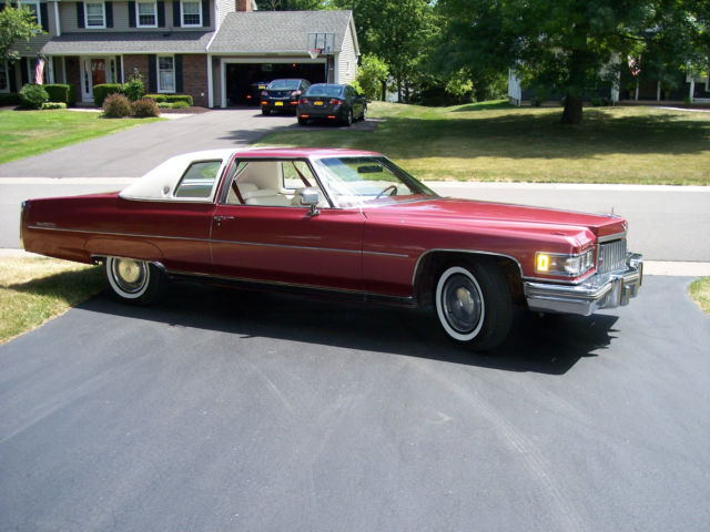 FANTASTIC 1975 CADILLAC COUPE DEVILLE RED, WHITE TOP, WHITE LEATHER. 32k MILES 1975 Cadillac DeVille