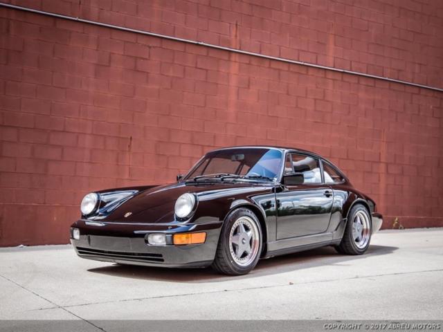 Fantastic 1990 Carrera 4, featured in Black on Black, only 60,600 miles. 1990 Porsche 911 Carrera 4