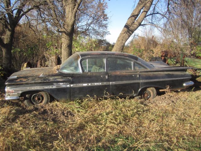 Free '34 Chevrolet & '63 Ford with the purchase of '59 Bel Air - (402) 527-8115 1959 Chevrolet Bel Air