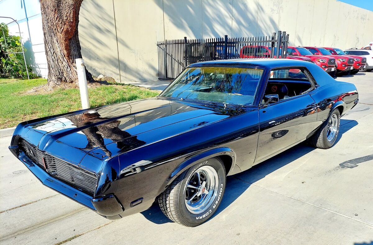 Gorgeous and fast! Black over Black. She ready for the shows and Saturday night. 1969 Mercury Cougar