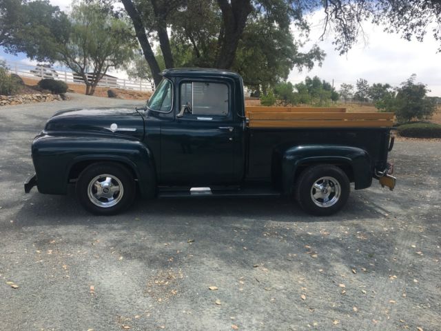 Green 1956 F-100 Ford Truck with wood bed and wood side panels 1956 Ford F-100