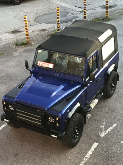 LAND ROVER DEFENDER 90 CSW V8 SOFT TOP STRIP CHASSIS UP REBUILD ESTORIL BLUE 1988 Land Rover Defender soft top