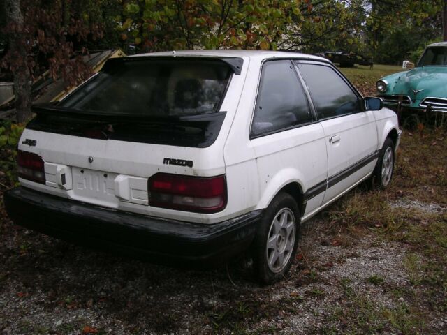 MAZDA 323 (white) GTX 4WD FACTORY TURBOCHARGED 1988 Mazda 323