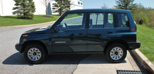 1995 Suzuki Sidekick NO RESERVE 58k miles Clean Carfax 4x4 - photo 10