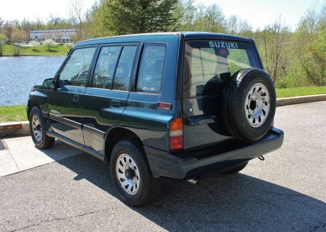 1995 Suzuki Sidekick NO RESERVE 58k miles Clean Carfax 4x4 - photo 12
