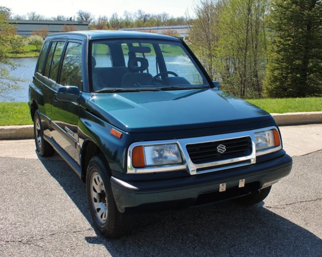 1995 Suzuki Sidekick NO RESERVE 58k miles Clean Carfax 4x4 - photo 3