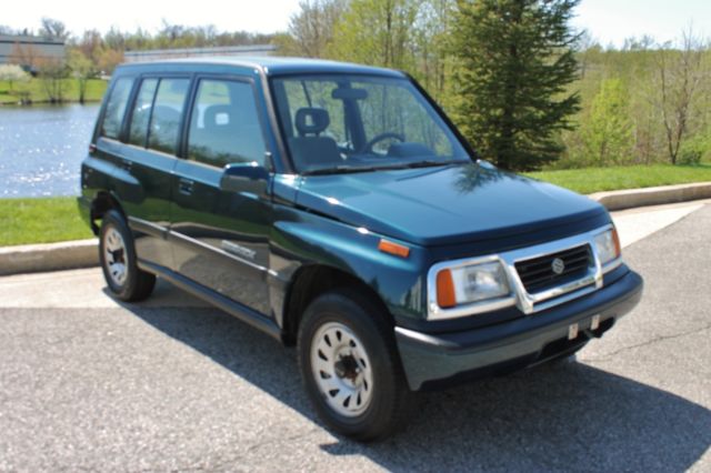 1995 Suzuki Sidekick NO RESERVE 58k miles Clean Carfax 4x4 - photo 4