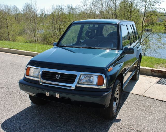 1995 Suzuki Sidekick NO RESERVE 58k miles Clean Carfax 4x4 - photo 7
