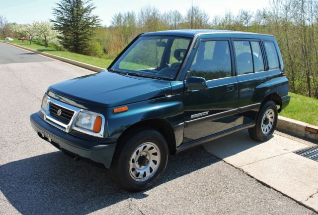 1995 Suzuki Sidekick NO RESERVE 58k miles Clean Carfax 4x4 - photo 9