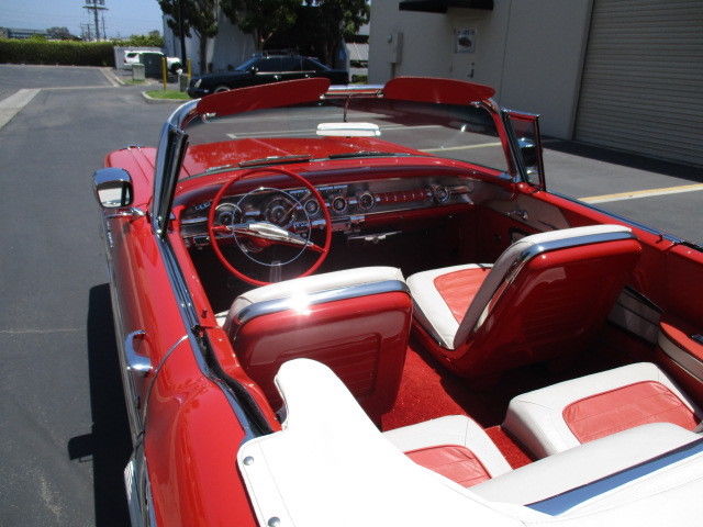 1958 Pontiac Bonneville Red and White leather bucket seats - photo 3
