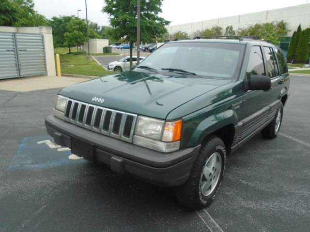 NO RESERVE-LOW MILES-SENIOR OWNED-OUTSTANDING CONDITION AND YES NO RESERVE!!!!! 1994 Jeep Grand Cherokee