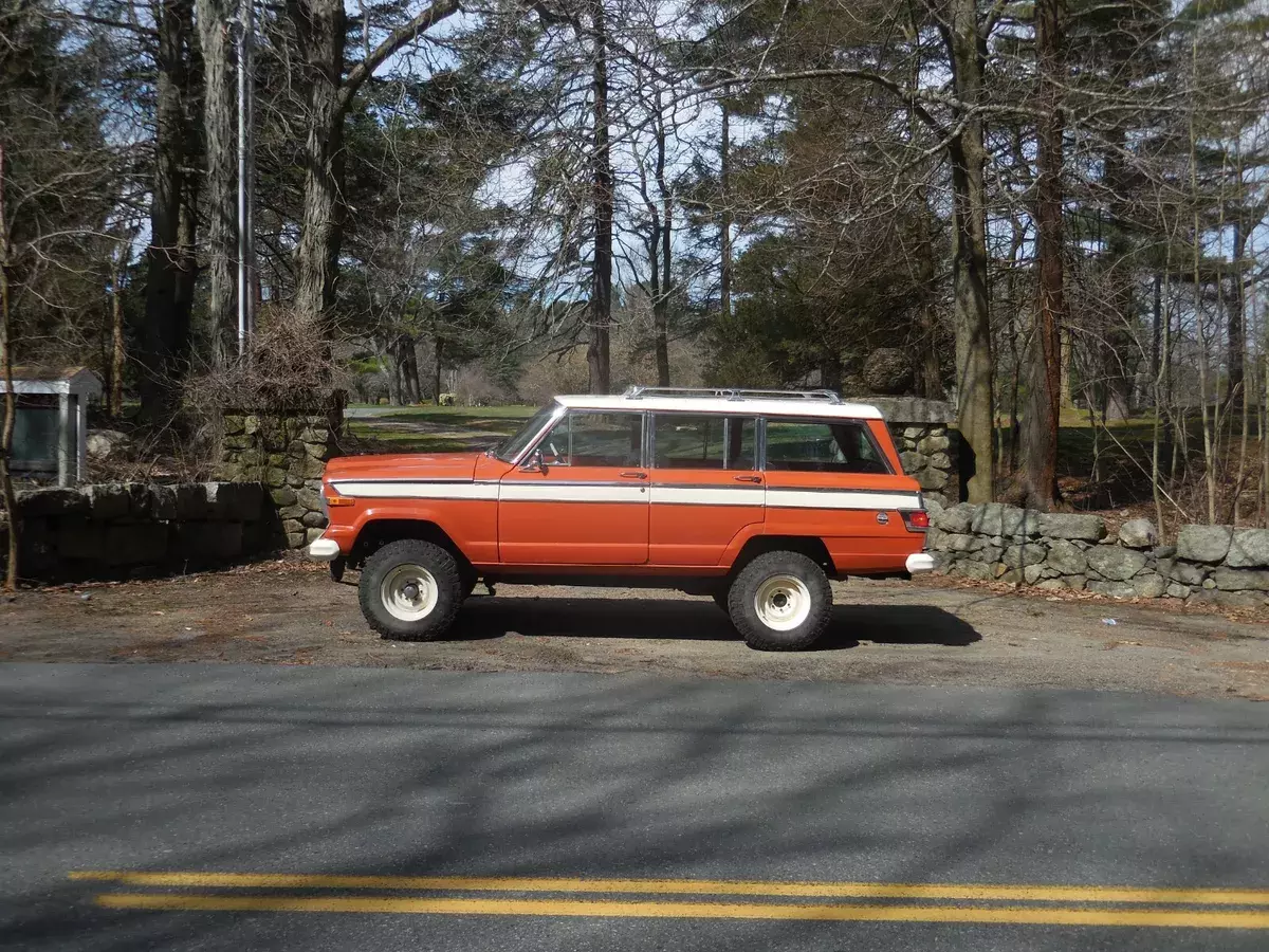 Omaha Orange with Custom interior and Lift Kit One of a Kind FSJ Restored 1976 Jeep Wagoneer