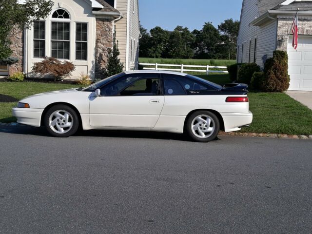 pearl white &black updated including wheels body,motor ,trans ,tires,interior , 1994 Subaru SVX stock