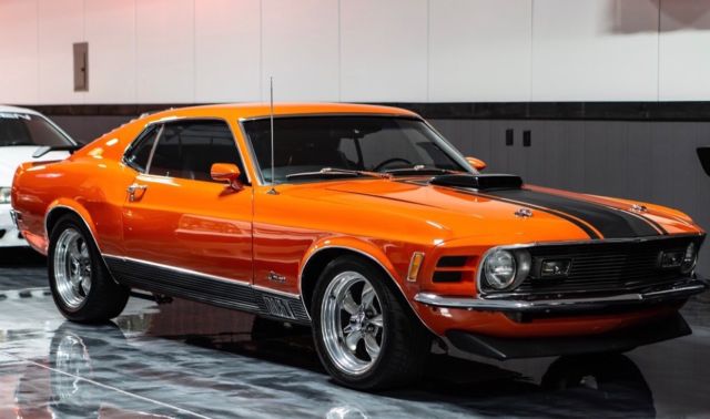 Perfect shade of Calypso Coral, 408 Stroker, 5 speed manual. 1970 Ford Mustang Mach 1