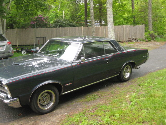 PHS DOCUMENT FINISHED FRAME OFF CHARCOAL BLUE METALIC TRIM TAGS NEVER REMOVED AN 1965 Pontiac GTO gto