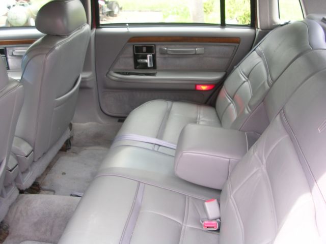 Red 1994 Lincoln Continental Signature 4 door sedan 1994 Lincoln Continental Chrome