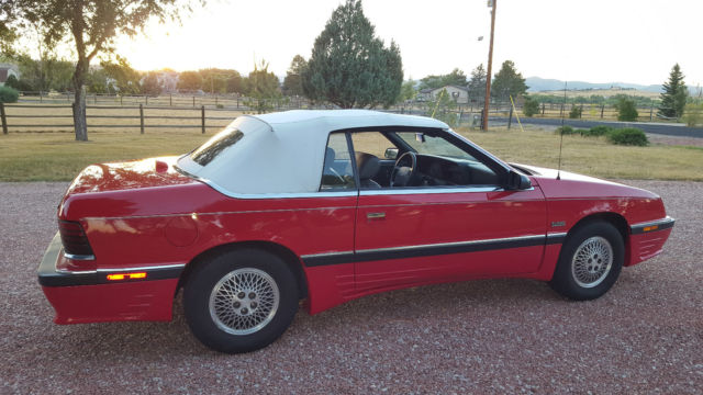 Red convertible with white top and special valence cover sport package 1989 Chrysler LeBaron