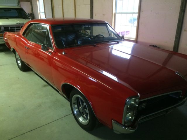 Red two door hard top 1967 Pontiac Tempest