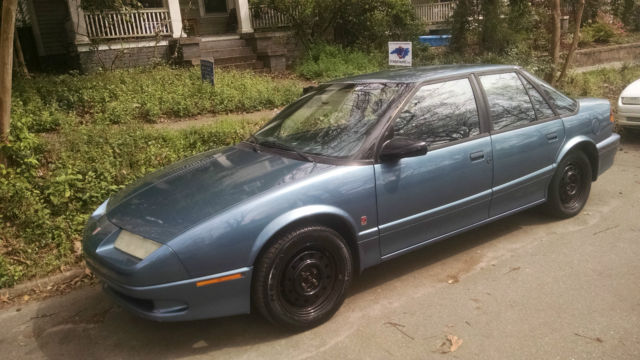 1993 Saturn S-Series SL2 sedan, 4-wheel disc-brakes