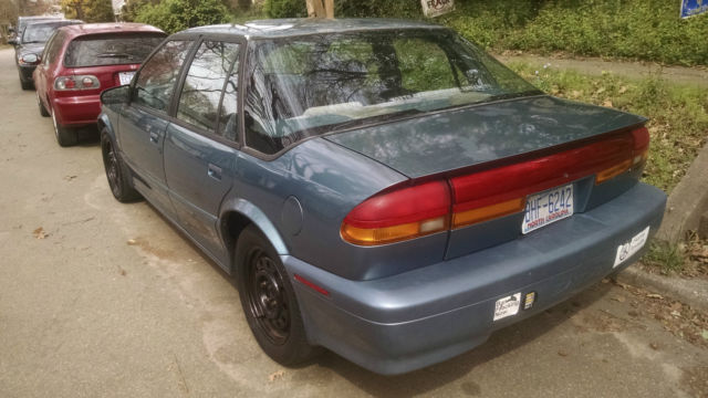 1993 Saturn S-Series SL2 sedan, 4-wheel disc-brakes - photo 2