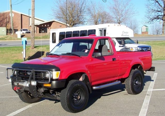 SHARP SLICK VERY CLEAN 4WD FUEL INJ CLOTH CARPET CD WARN WINCH BRUSH GUARD HILUX 1994 Toyota Tacoma 4X4 2.4L 22RE 4CYL 5-SPEED BRIGHT RED SHORT BED SOLID RIG