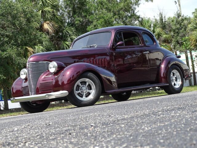 Show quality with ghost flames, a 400 CID V8, 200R4 automatic, Ice Cold A/C! 1939 Chevrolet Deluxe Business Coupe
