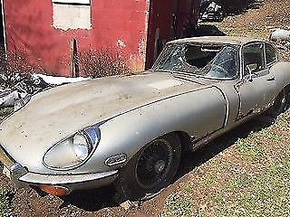 Silver with red interior, 4 speed trans, low miliage, matching numbers 1969 Jaguar E-Type