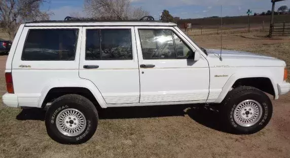 This 1992 Jeep Cherokee Limited Gold and White Edition 1992 Jeep Cherokee LIMITED