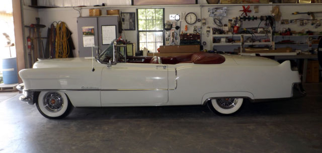 This is a numbers matching, 95 point national, state and local show winner. 1955 Cadillac Convertible Coupe