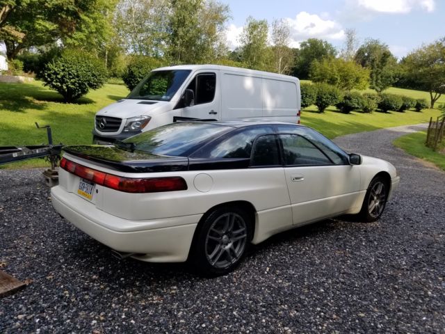 Two 1992 Subaru SVX LSL AWD cars, plus 2 extra doors 1992 Subaru SVX LSL