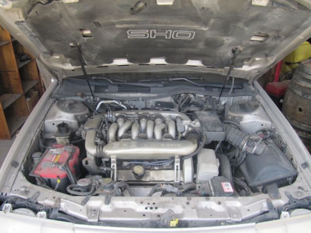 Two (2) 1989 Ford Taurus SHO, One very good running car the other is a parts car 1989 Ford Taurus SHO