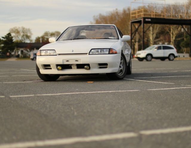 White 4 Door Skyline GTS-T - TEIN coilovers - Greddy blowoff valve - turbo 1990 Nissan Skyline GTS-T